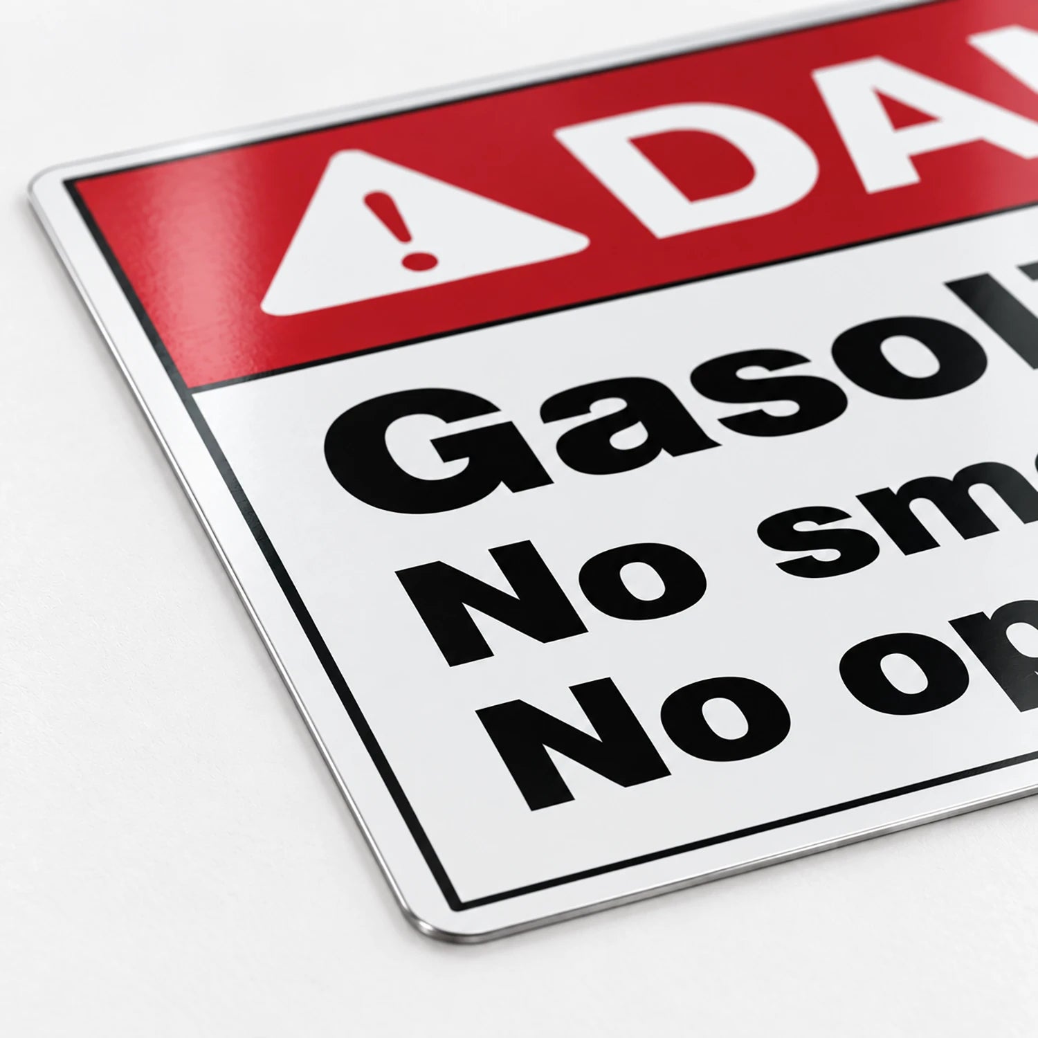 Danger — Gasoline. No Smoking. No Open Flames.