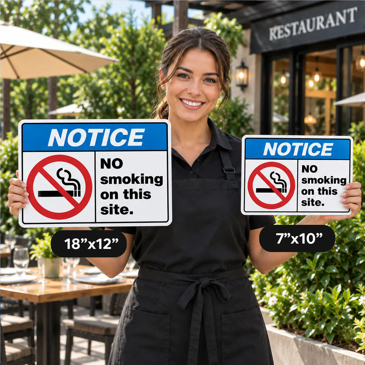 A woman in a black apron stands outdoors holding two smoking prohibition signs. One sign is labeled 18"x12" and the other 7"x10".