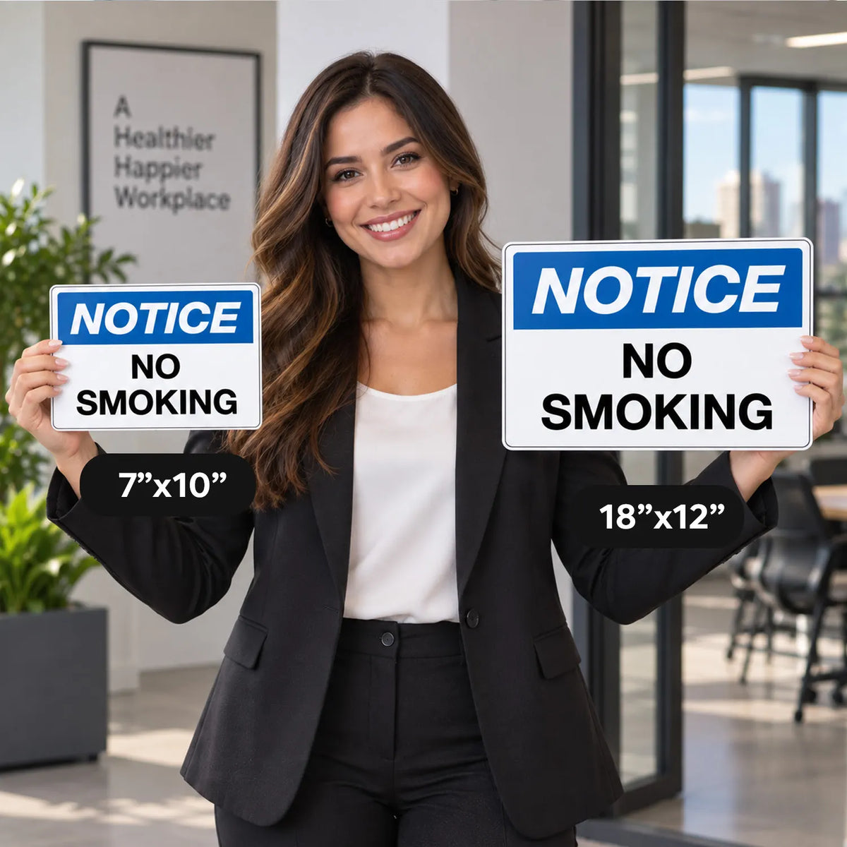 A woman in a black blazer and white top stands in an office holding two 'NOTICE NO SMOKING' signs. One sign is labeled 7"x10" and the other 18"x12".