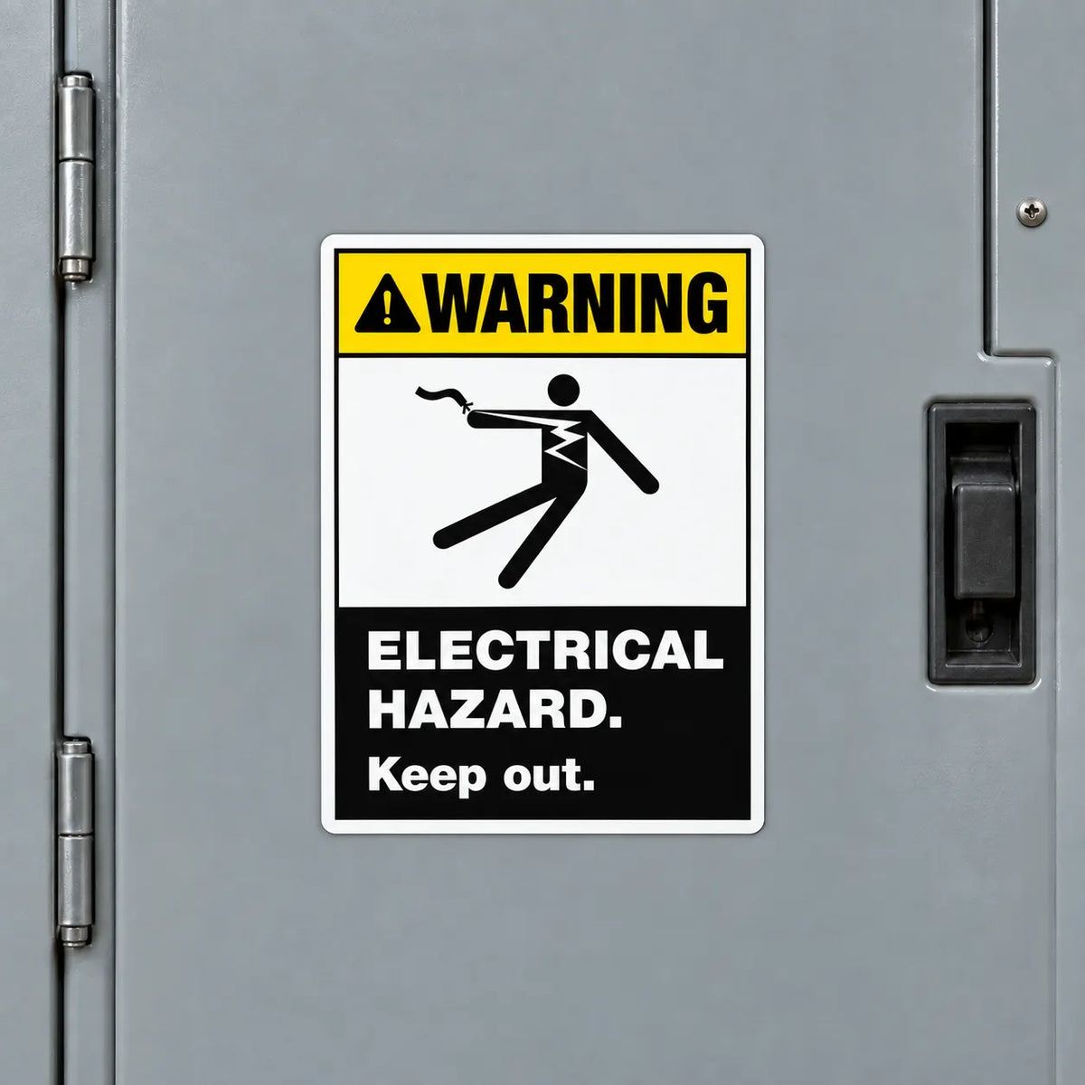 An electrical hazard warning sign with a yellow, white, and black color scheme, displayed on a gray metal electrical panel door.